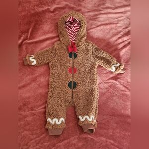 Brown Fleece Baby Onesie with Red Accents